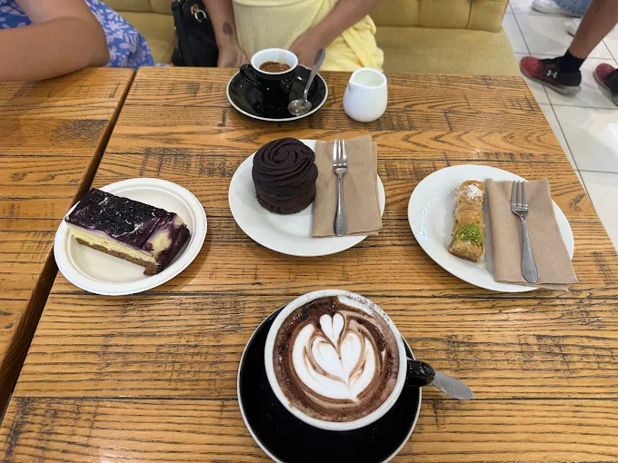 Presshouse coffees and cake on the table